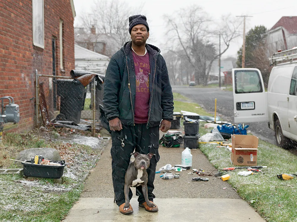 Single man working on a house in Detroit